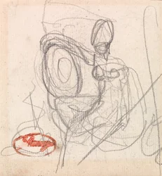 Figura sentada con casco y escudo